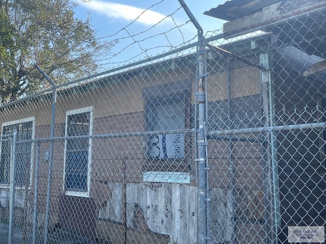 view of home's exterior with an outbuilding