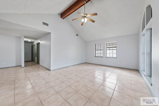 tiled spare room with beam ceiling, ceiling fan, high vaulted ceiling, and a textured ceiling