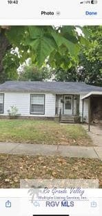 ranch-style home with a carport