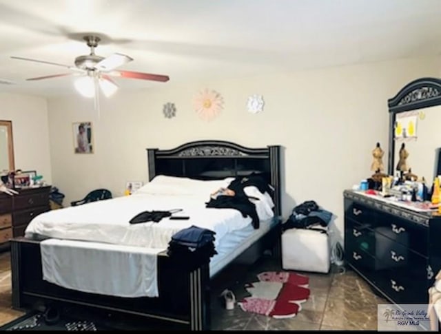 bedroom featuring ceiling fan