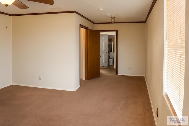 34719 Los Ranchos Rd Unit 1, San Benito, TX 78586 - carpeted spare room featuring ceiling fan and crown molding