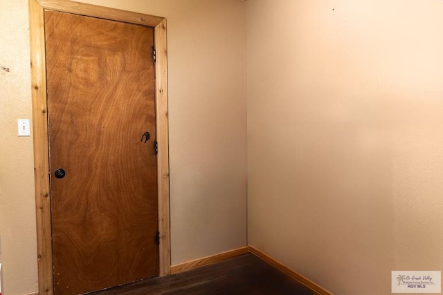 interior space with dark wood-type flooring