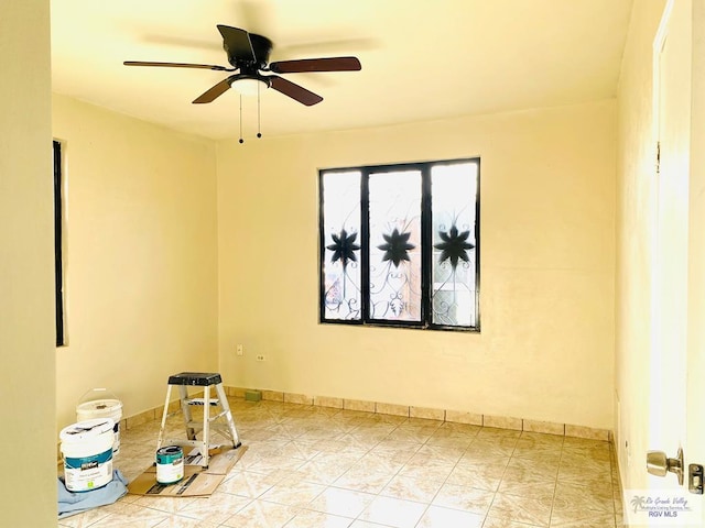 empty room featuring ceiling fan