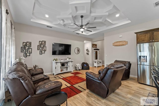 living room featuring beamed ceiling, light wood-type flooring, ceiling fan, and coffered ceiling