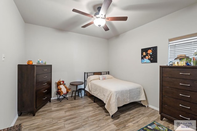 bedroom featuring ceiling fan and light wood-type flooring