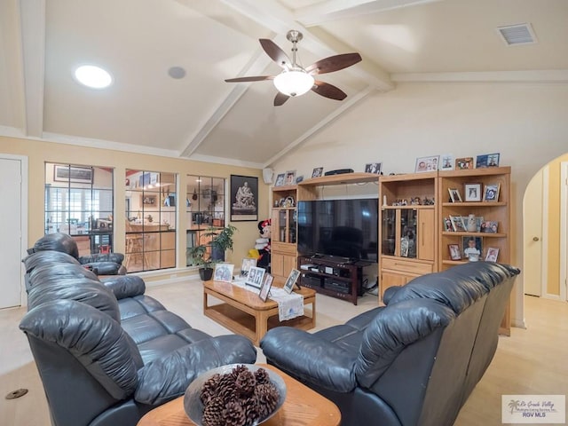 living room with ceiling fan and lofted ceiling with beams