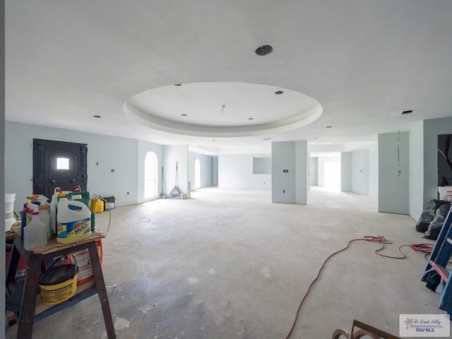 interior space with a tray ceiling