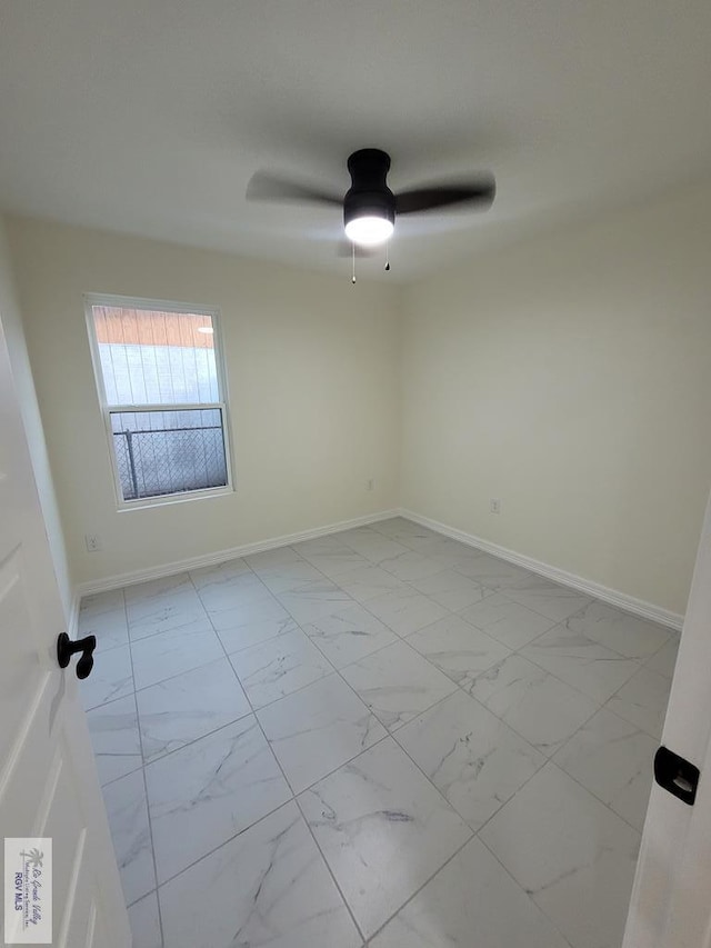 unfurnished room featuring ceiling fan