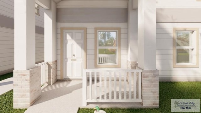 doorway to property featuring a porch