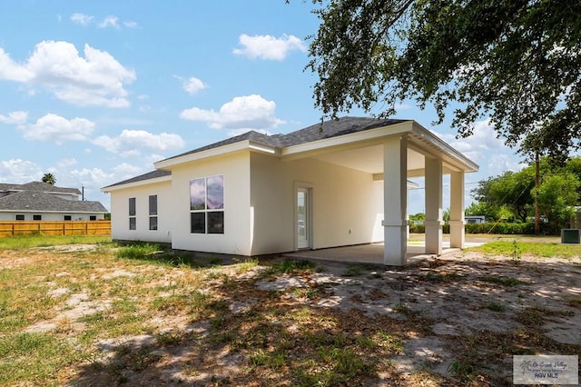 rear view of house featuring a patio area