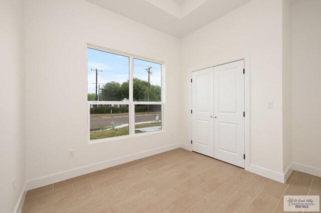 unfurnished bedroom featuring a closet