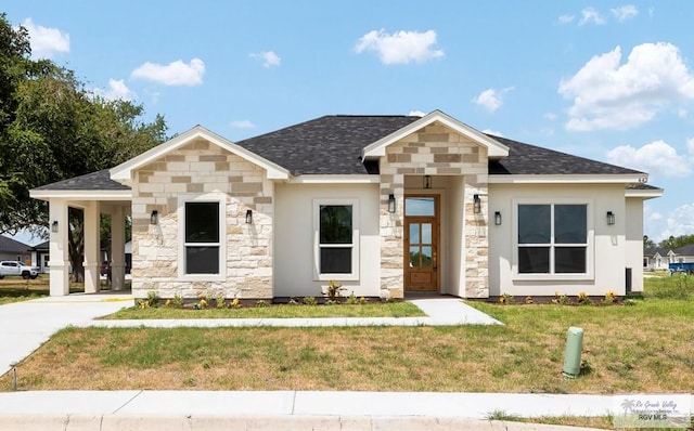 view of front of home with a front lawn