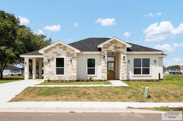 view of front of home with a front lawn