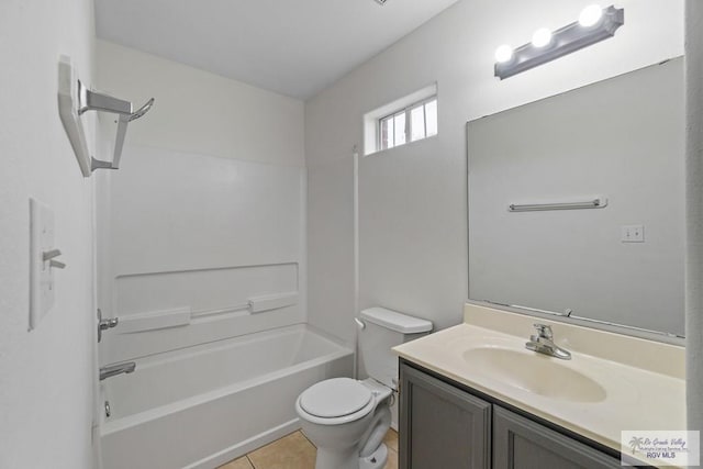 3017 Paradise Ave, Harlingen, TX 78552 - bathroom featuring vanity, toilet, shower / tub combination, and tile patterned flooring