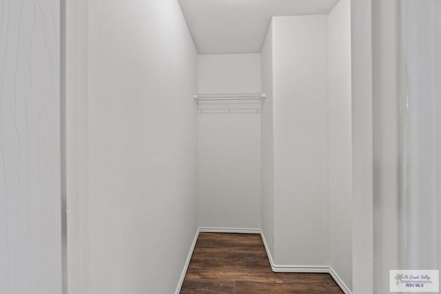 3017 Paradise Ave, Harlingen, TX 78552 - spacious closet featuring dark wood-type flooring