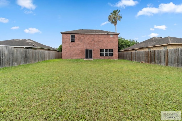 3017 Paradise Ave, Harlingen, TX 78552 - rear view of house featuring brick siding
