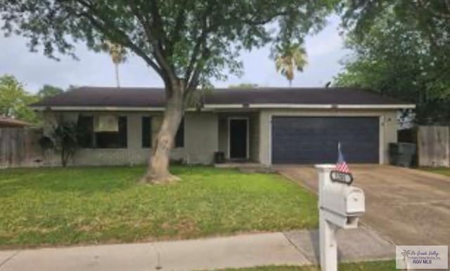 2201 Emerald Lake Dr, Harlingen, TX 78550 - single story home featuring concrete driveway and an attached garage