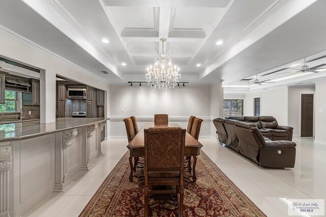 dining space featuring crown molding, beamed ceiling, light tile patterned floors, and ceiling fan with notable chandelier