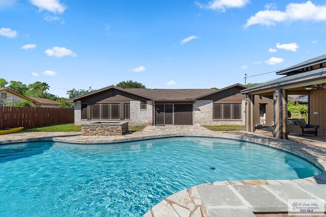 view of swimming pool featuring a patio