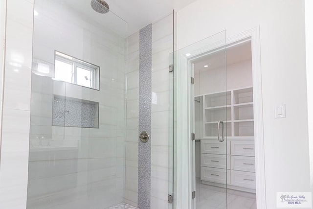 full bath with a shower stall