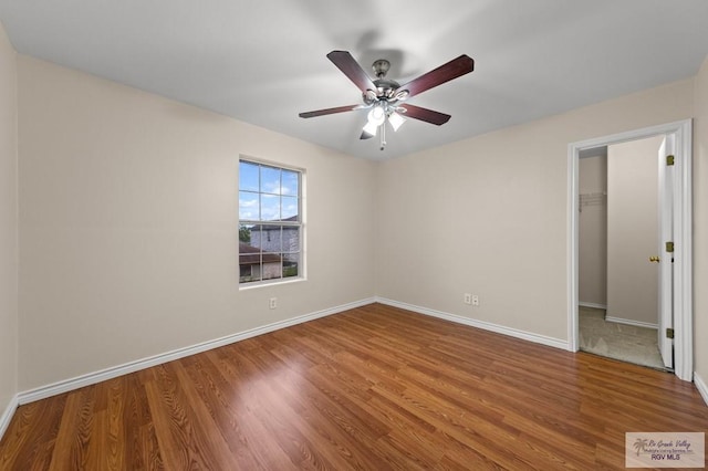 2344 Munich St, Brownsville, TX 78520 - spare room with wood finished floors and ceiling fan