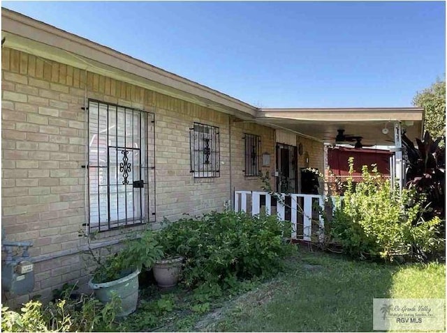 property entrance with covered porch