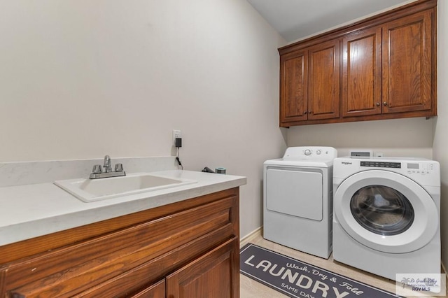 16756 E Barger Ct, Harlingen, TX 78552 - laundry area with cabinet space and washing machine and dryer