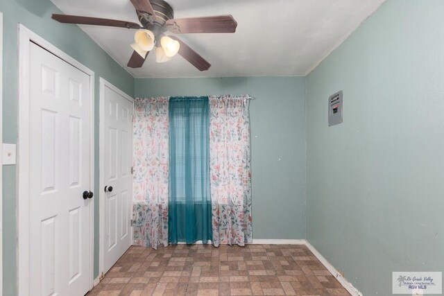 unfurnished bedroom with ceiling fan