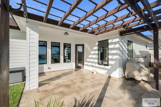 view of patio featuring a pergola