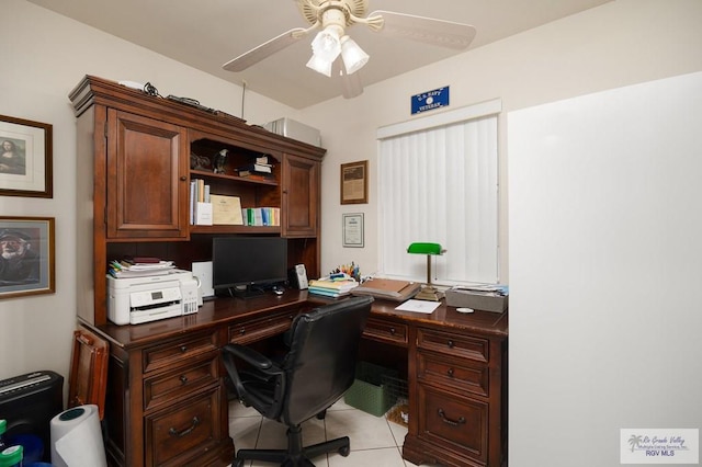 home office with ceiling fan and light tile patterned floors