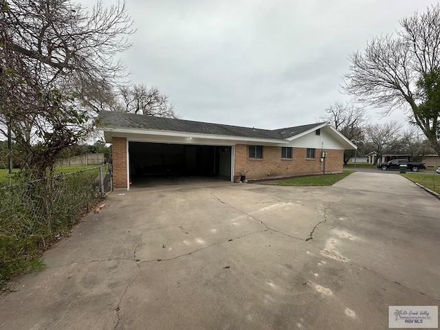 view of side of home featuring a garage