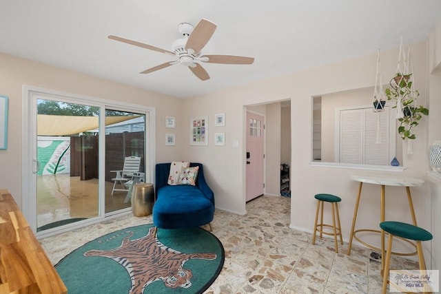 1215 Bluebonnet Dr, Brownsville, TX 78521 - living area with ceiling fan and baseboards