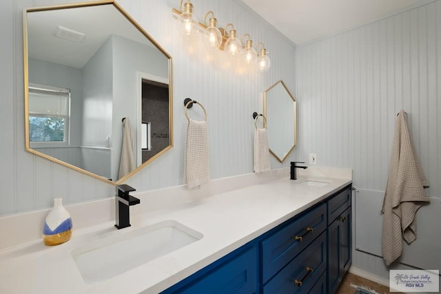 1215 Bluebonnet Dr, Brownsville, TX 78521 - full bathroom with double vanity