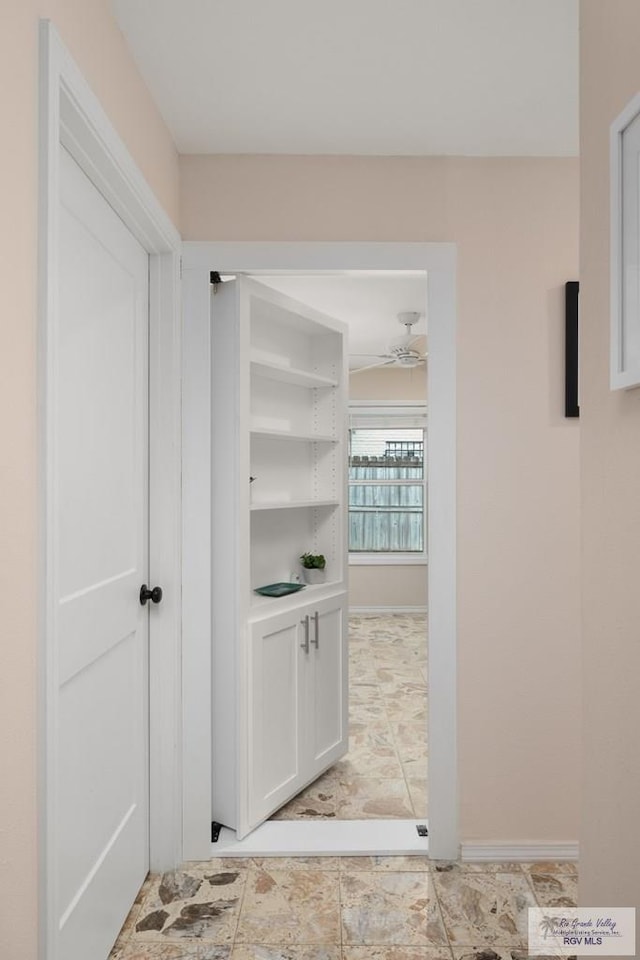 1215 Bluebonnet Dr, Brownsville, TX 78521 - hallway featuring baseboards