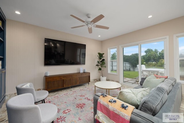 1215 Bluebonnet Dr, Brownsville, TX 78521 - living area with healthy amount of natural light, ceiling fan, and recessed lighting