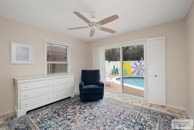 1215 Bluebonnet Dr, Brownsville, TX 78521 - sitting room with a ceiling fan and baseboards