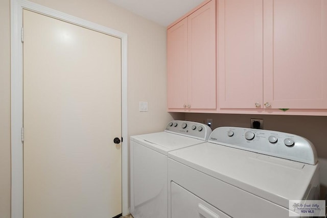 1215 Bluebonnet Dr, Brownsville, TX 78521 - washroom featuring cabinet space and washer and clothes dryer