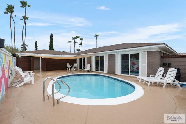1215 Bluebonnet Dr, Brownsville, TX 78521 - outdoor pool featuring a patio