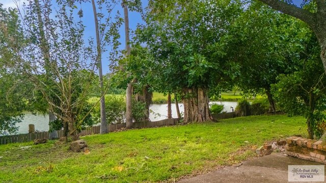 115 E Armstrong Ct, Brownsville, TX 78521 - view of yard with a water view