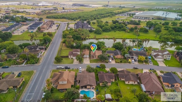 115 E Armstrong Ct, Brownsville, TX 78521 - aerial overview of property's location featuring a large body of water and nearby suburban area