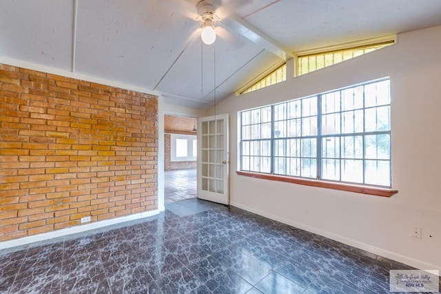 115 E Armstrong Ct, Brownsville, TX 78521 - unfurnished room featuring ceiling fan, baseboards, and brick wall