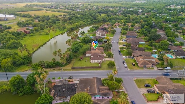 115 E Armstrong Ct, Brownsville, TX 78521 - aerial perspective of suburban area with a large body of water