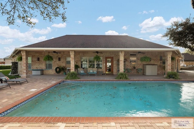 pool featuring a patio area and ceiling fan