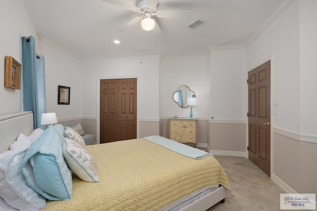 bedroom with light colored carpet, visible vents, crown molding, and baseboards