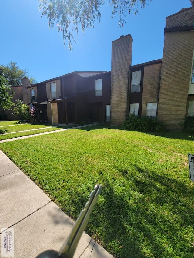 exterior space with a front yard