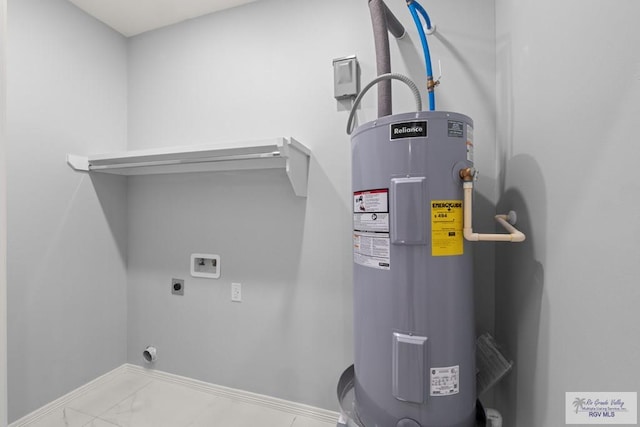 utility room featuring electric water heater