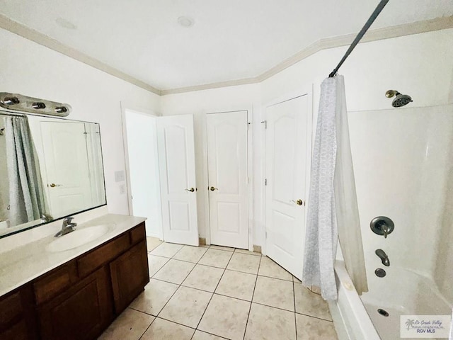 bathroom with crown molding, shower / tub combo with curtain, vanity, and tile patterned flooring