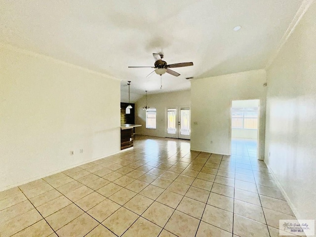 tiled spare room featuring ceiling fan