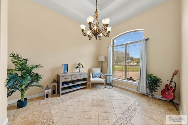 living area featuring a chandelier, baseboards, and light tile patterned floors