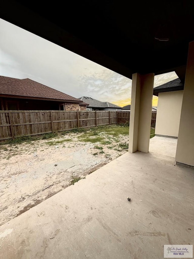 view of yard with a patio and a fenced backyard